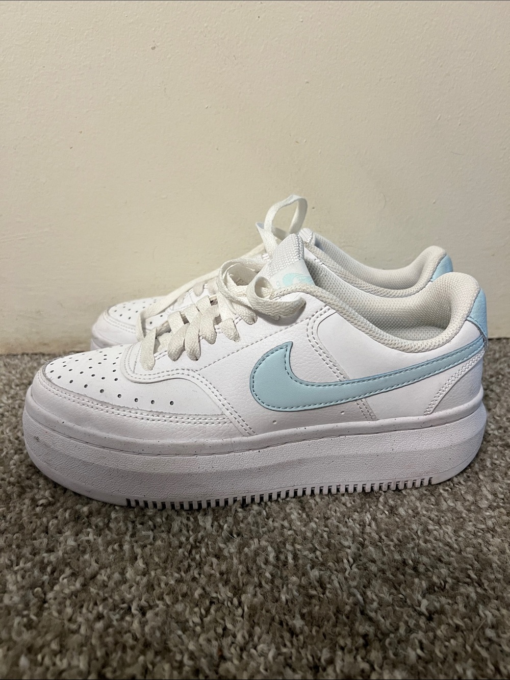 Nike Women’s White Sneakers with Light Blue Swoosh